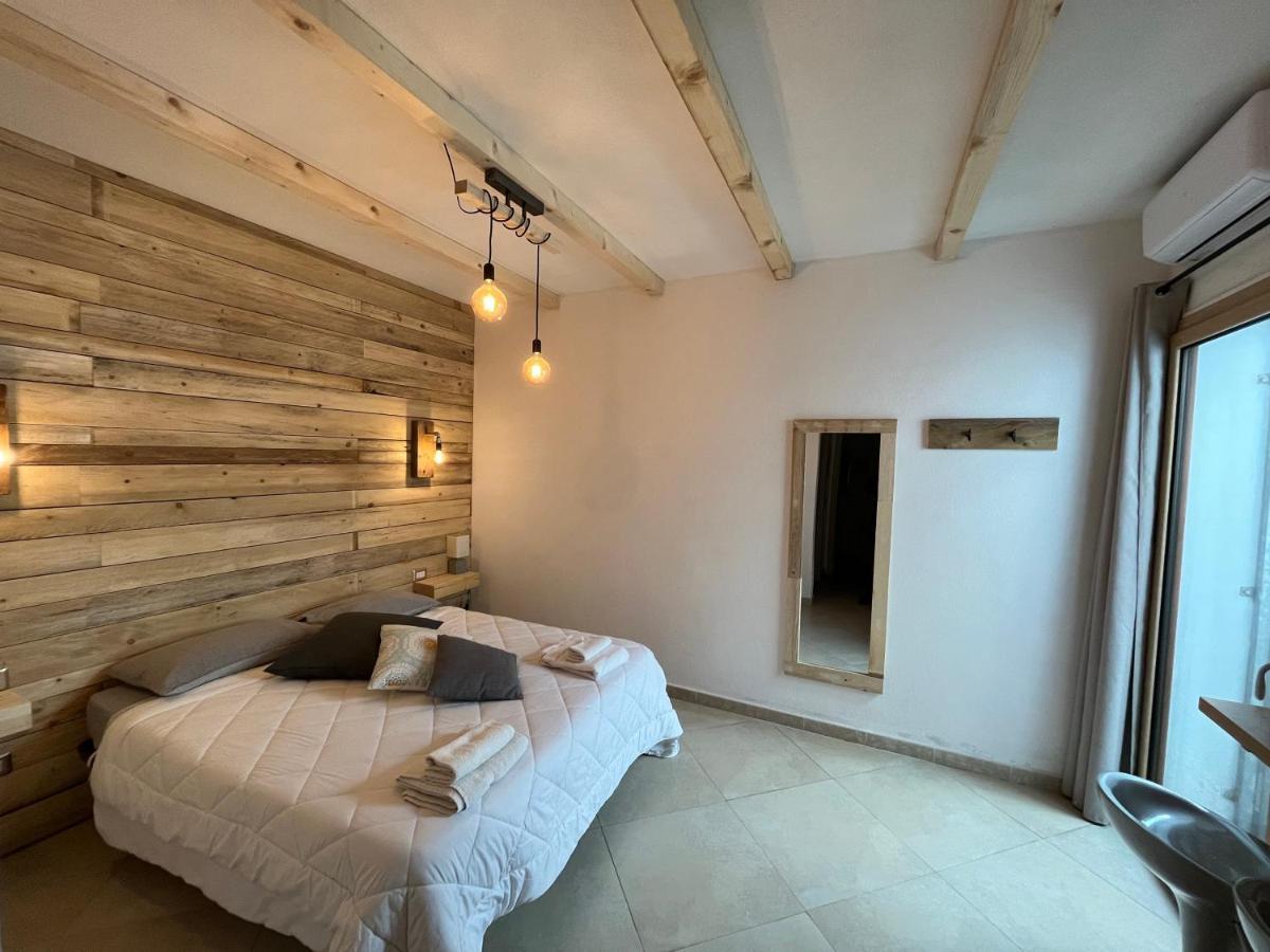 Iknos Guest House Olbia Buitenkant foto